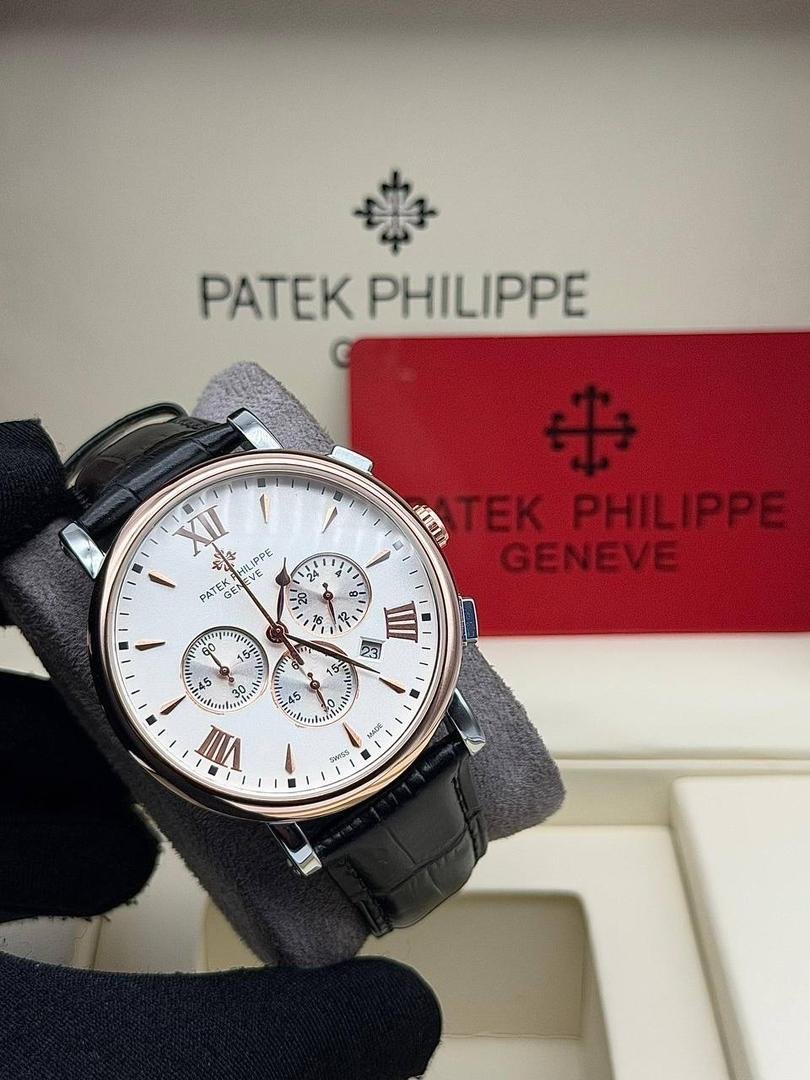 Patek Philippe chronograph watch with black leather strap and silver case