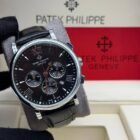 Patek Philippie chronograph watch with leather strap, sleek silver case, and black dial featuring chronograph subdials