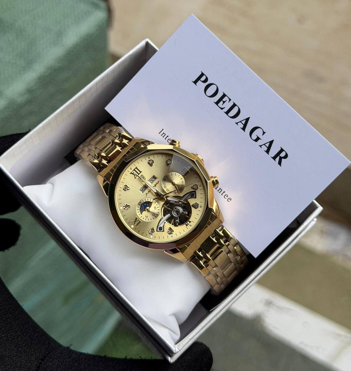 Poedagar Automatic Chain Watch featuring a stainless steel chain strap, sapphire glass face, and water-resistant case