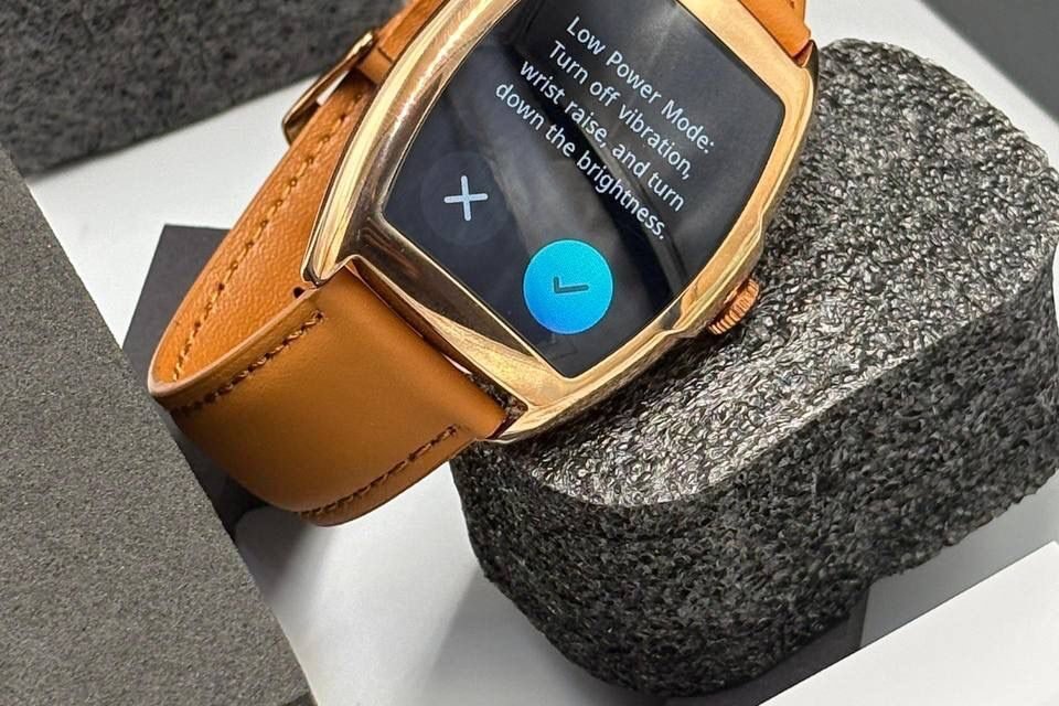 Brown Dafit Franck Muller smartwatch with leather strap displaying a custom watch face